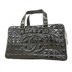 Chanel Chocobar handbag in patent leather and black for women
